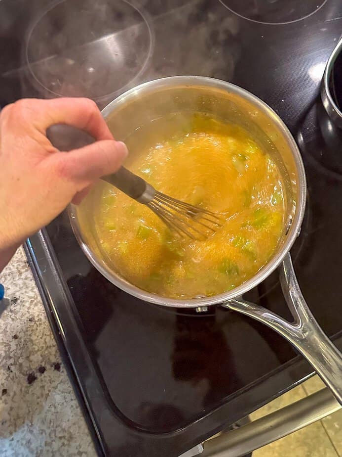 Whisk stirring while polenta cooks
