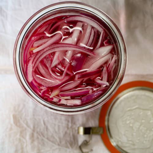 Jar of pickled red onion.