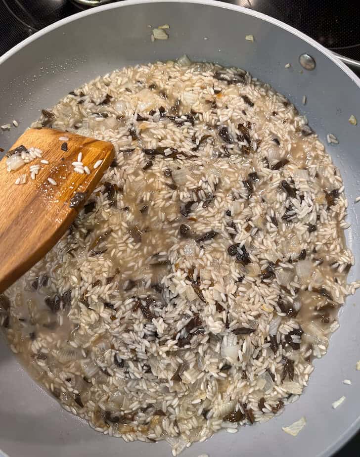 Risotto cooking in pan.
