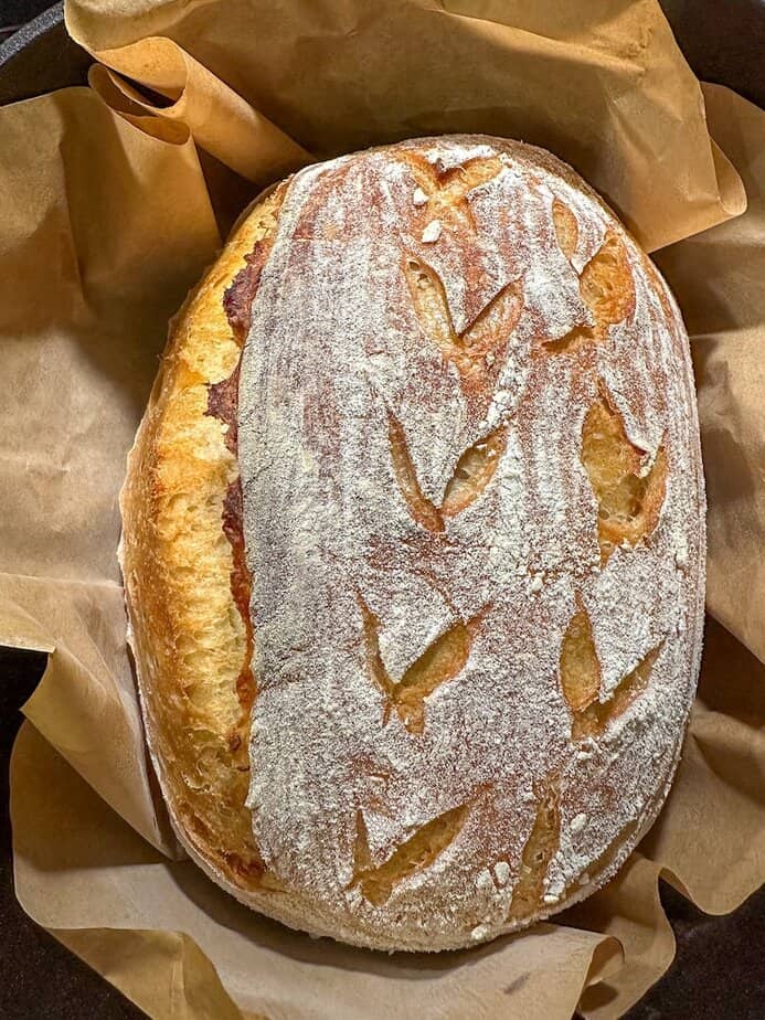 Oblong shaped sourdough bread after baking.