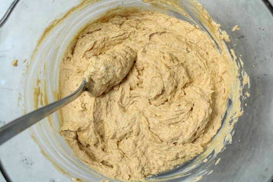 Peanut butter and banana frozen treat mixture in a bowl.