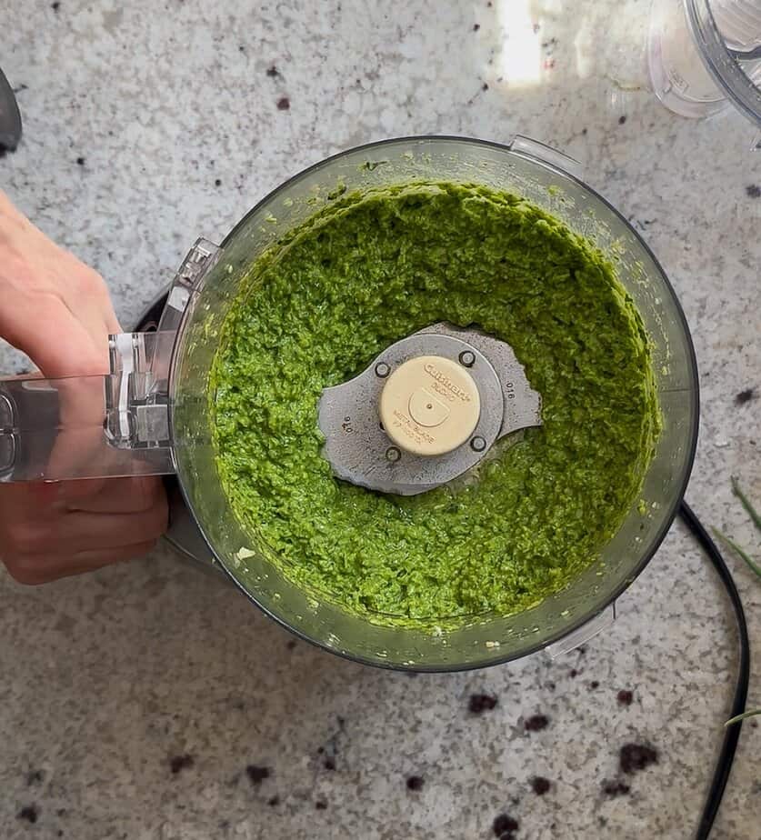 Garlic scape pesto blended in food processor.