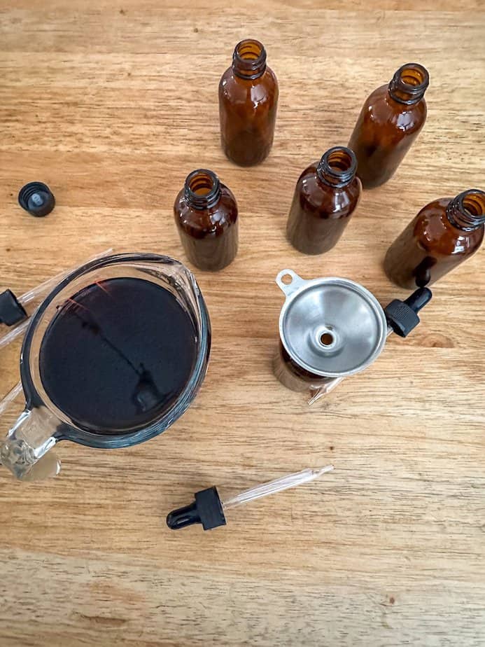 Lemon balm extract before being poured into storage bottles.