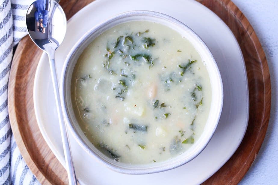 Creamy Kale and White Bean Soup in a soup bowl.