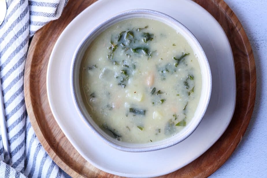 Creamy Kale and White Bean Soup in a soup bowl.