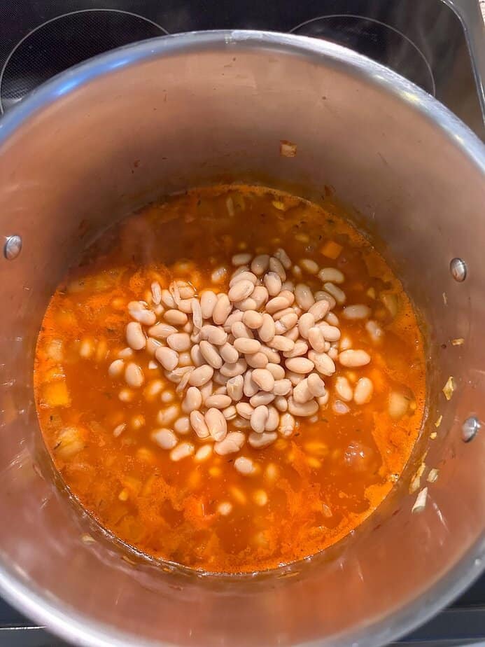 White beans added to the soup.