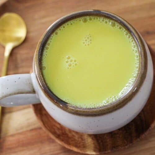Golden turmeric latte in a mug.