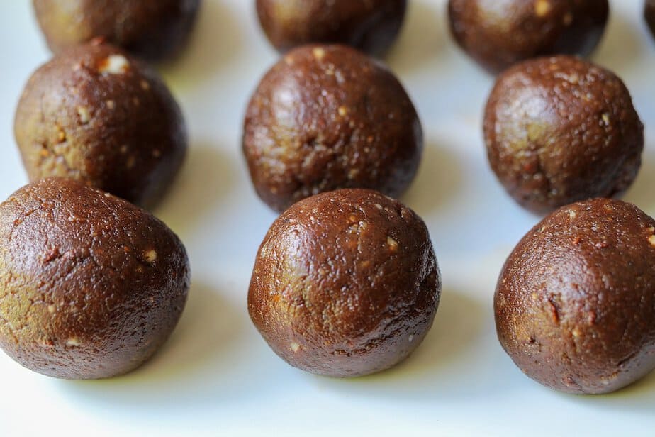 Black bean brownie balls on a plate.