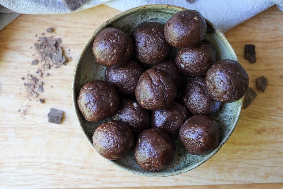 Black bean peanut butter brownie ball treats in a bowl.