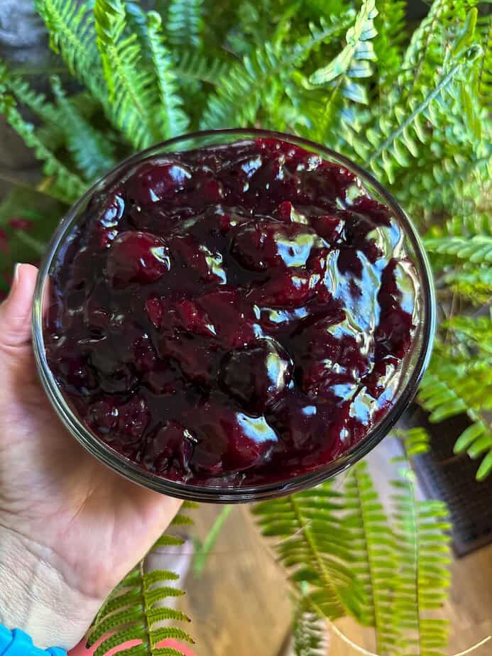 Cherry pie filling in a bowl.