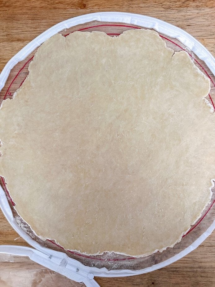 Pie crust dough rolled in a circle.