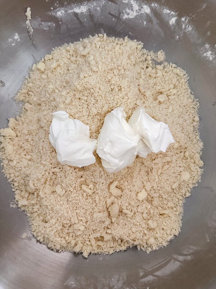 Sour cream added to flour mixture.