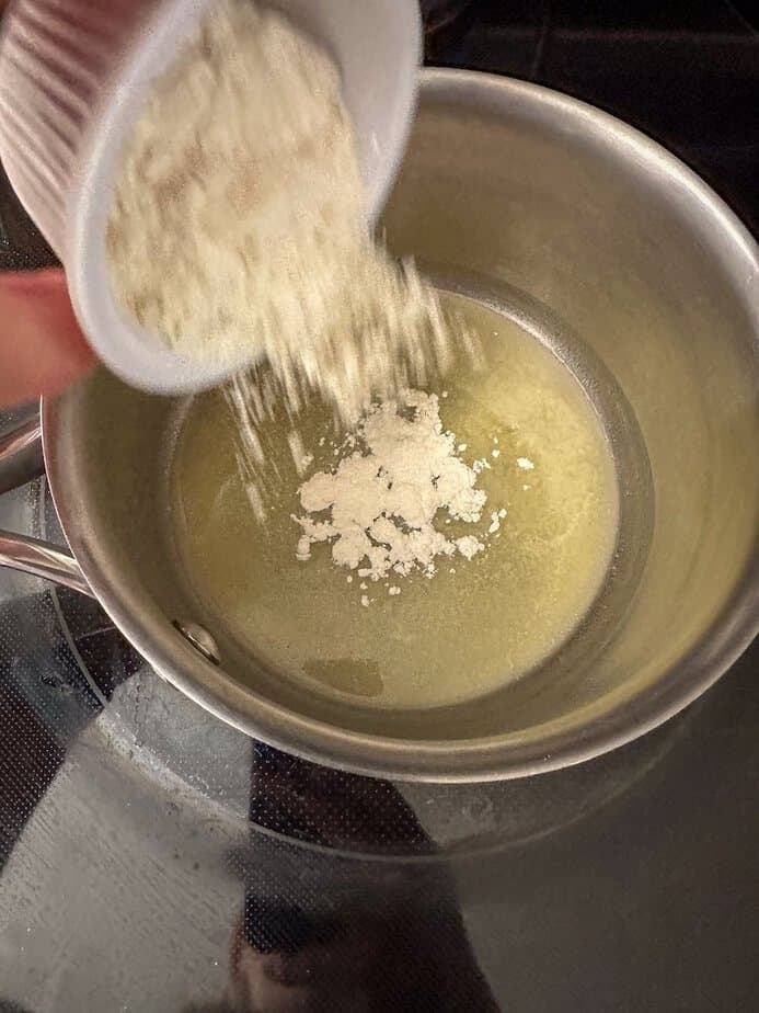 Flour added to melted butter in a saucepan.