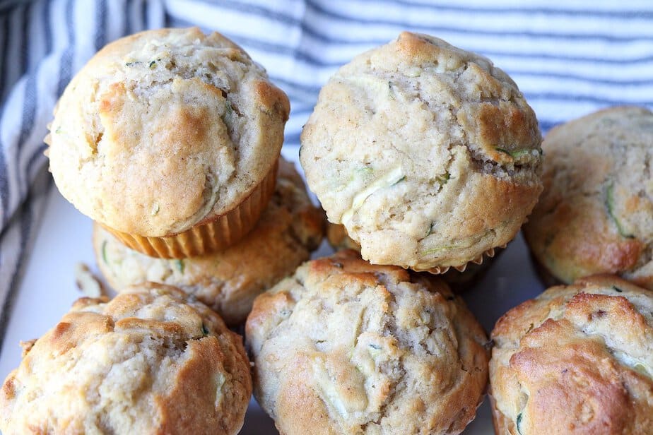 Baked sourdough discard zucchini muffins.