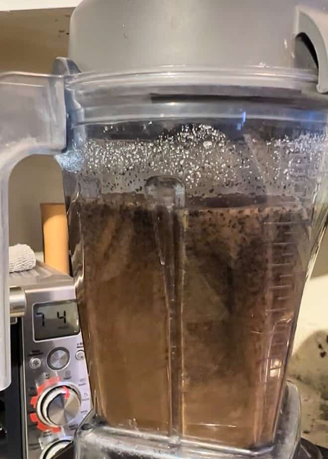 Vanilla bean paste blending in a high-speed blender. 